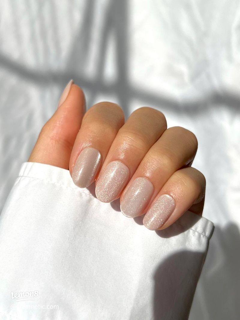 Neutral-Toned Russian Manicure with Tiny Gems