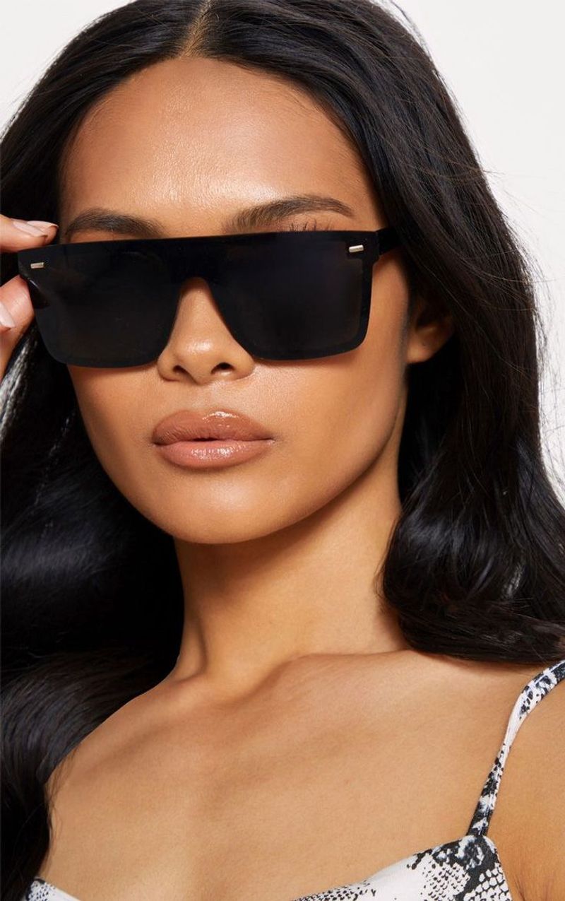Oversized Sunglasses: Face-Framing Shield