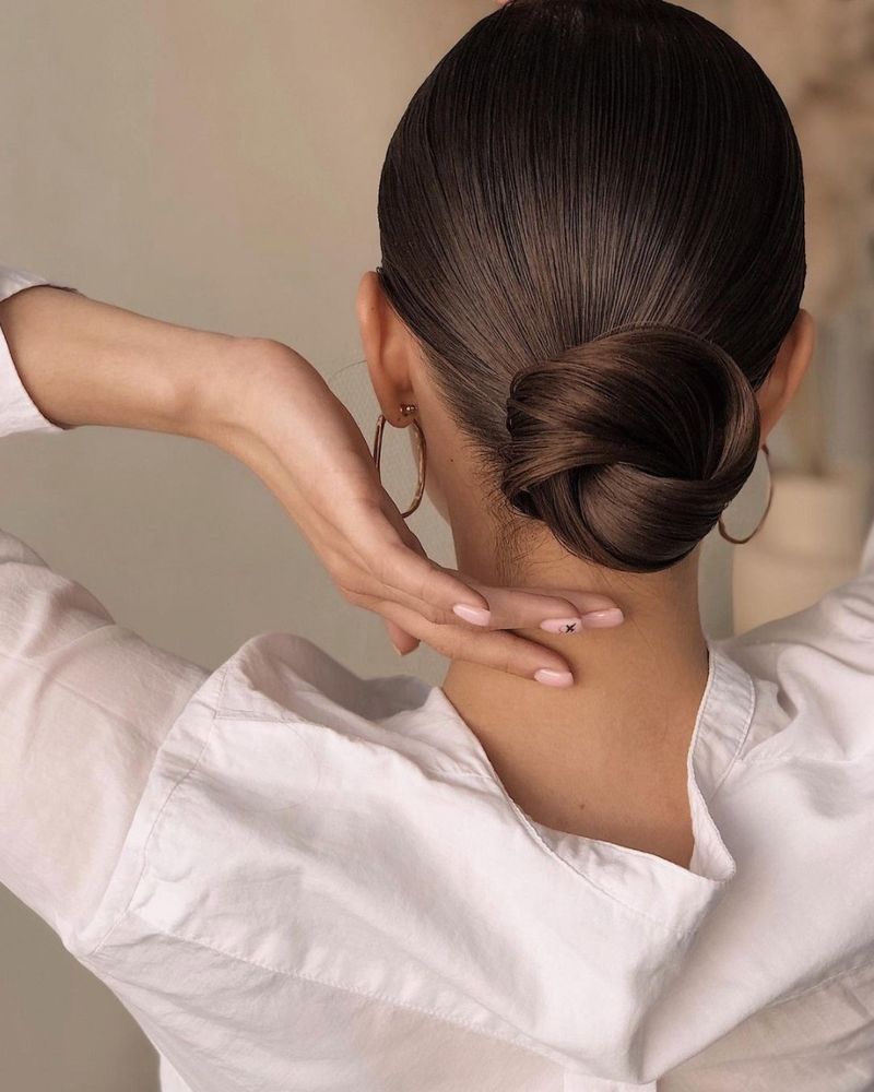 Low Bun with Middle Part