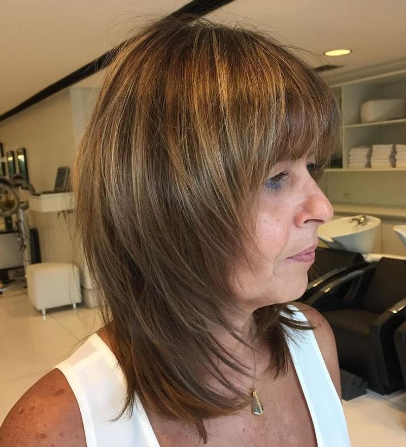 Mid-Length Cut with Face-Framing Layers
