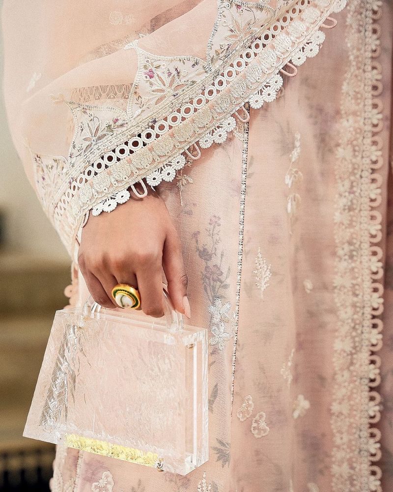 Sleek Acrylic Clutch with Gold Trim