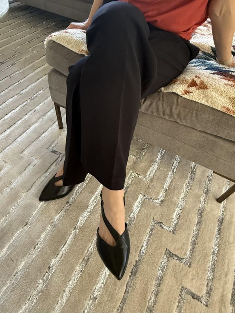 Pointed-Toe Flats Elongate Everything