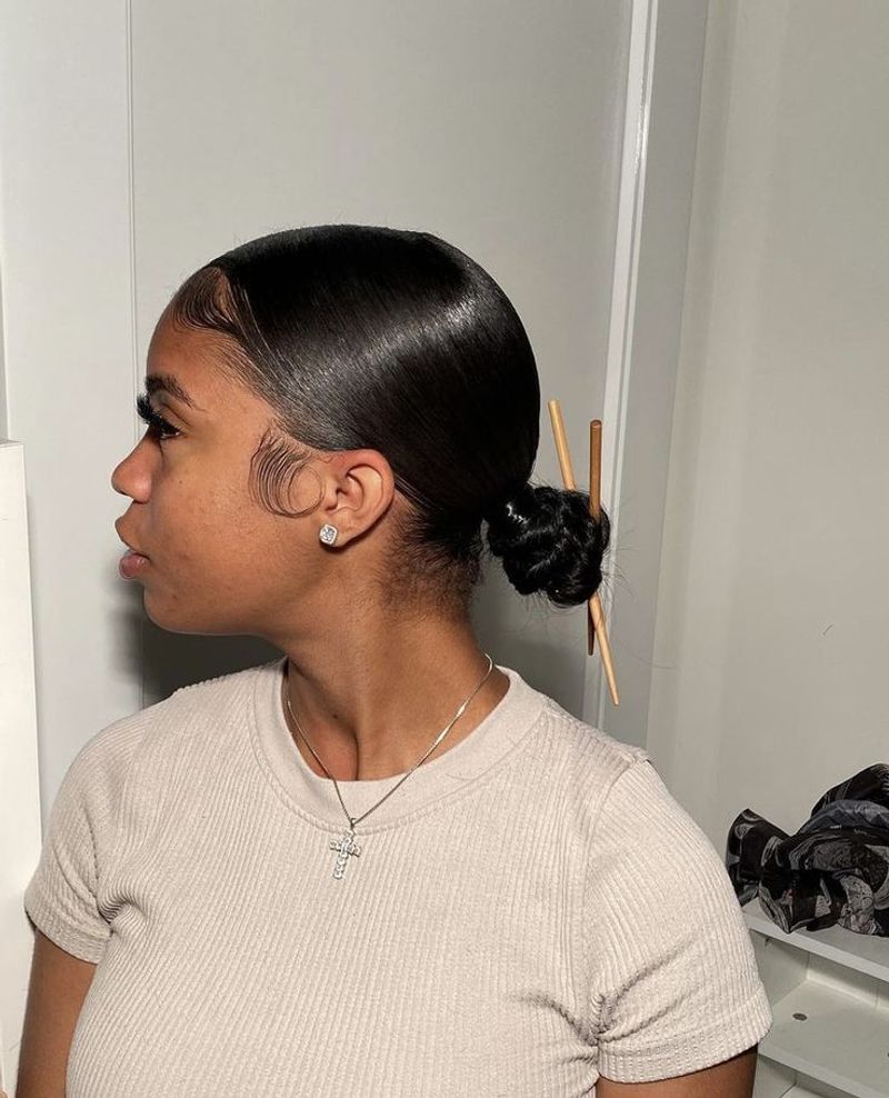 Low Bun with Slicked Edges